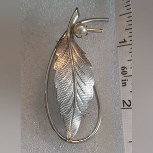 Elegant Silver Feather Brooch